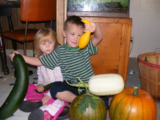 Sarah and Noah show off our harvest