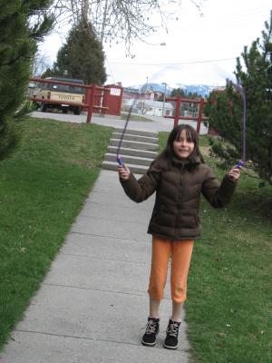 Malia plays with a jumprope.