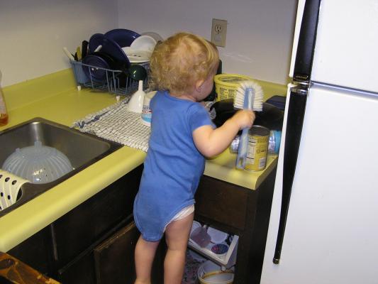 Noah is cleaning with mommy.