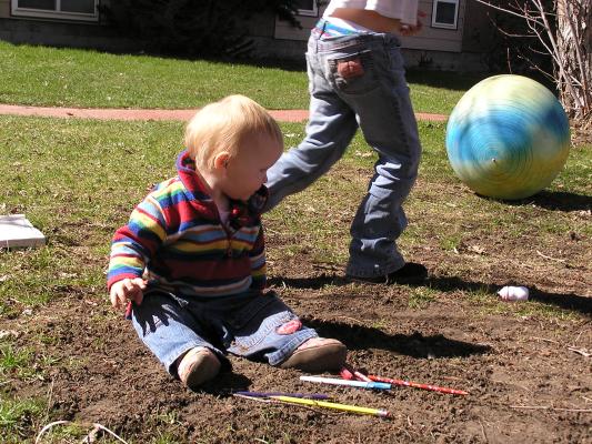 Kids playing in the yard.