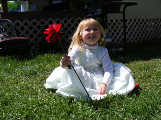 This is supposed to look like one of the photos of kids with roses.