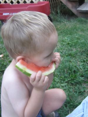 Noah eats some watermelon.