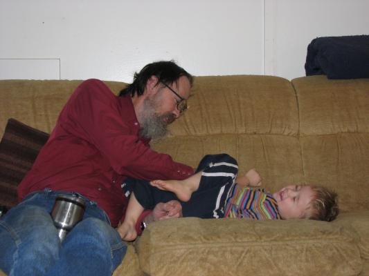 Robert and Noah on the couch.