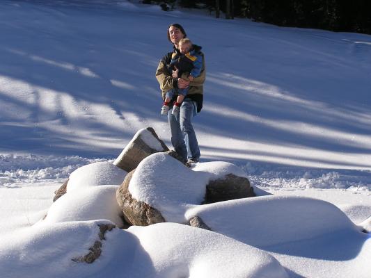 David and Noah stand on some rocks.