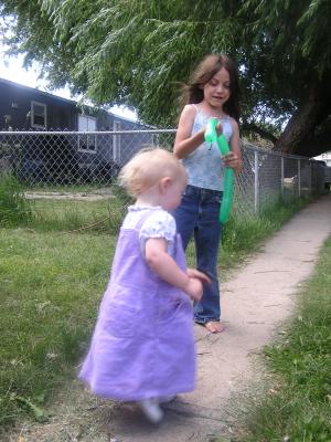 Sarah with Andrea, who has a water baloon