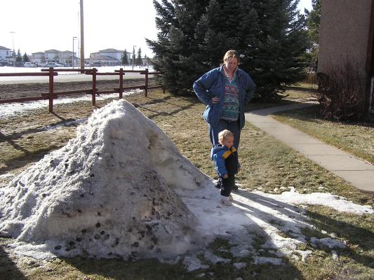 Katie and Noah by our snow fort.