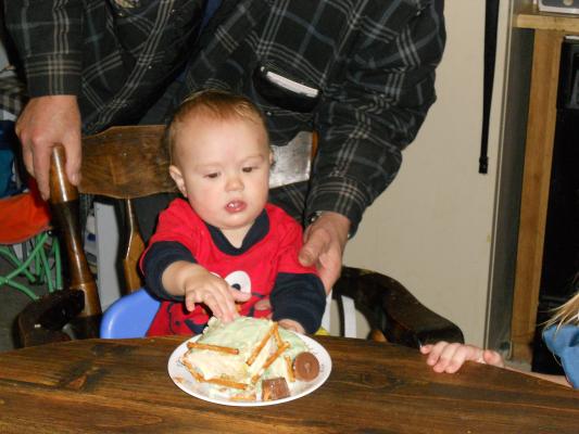 Joshua eats cake. 