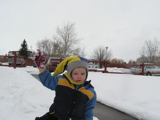 Noah plays in the snow.