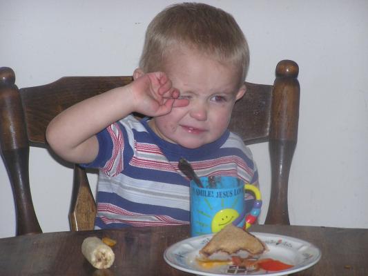 Noah really likes warm chocolate with a spoon.