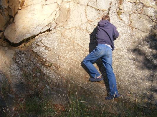 David climbing a rock in Sourdough canyon