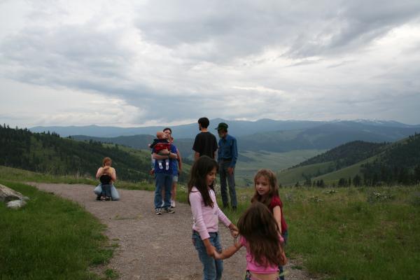 The girls play on the trail.