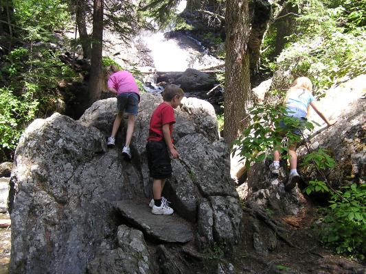 GVCC kids play on the rocks.