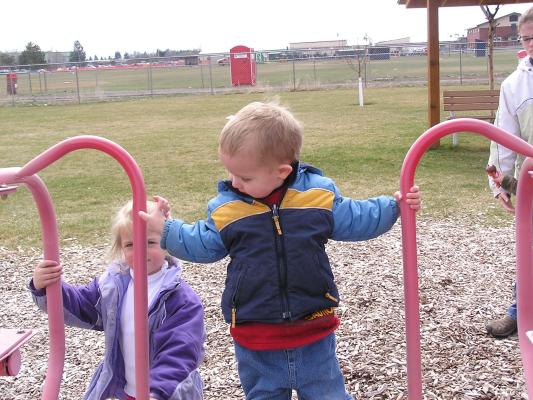 Kids play at the park before the Easter egg hunt.