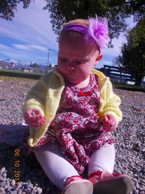 Hannah looks at gravel.