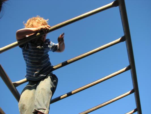 Noah on monkey bars