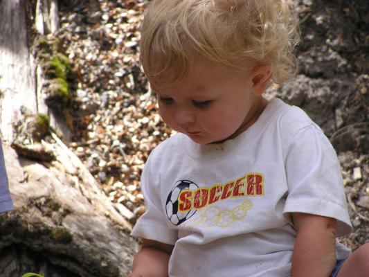 Noah in his soccer shirt.
