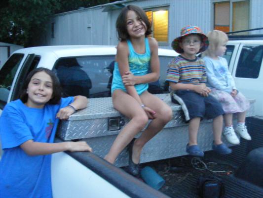 Malia, Andrea, Noah and Sarah in Jim's truck