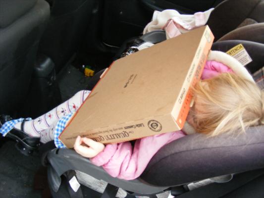 Sarah falls asleep holding pizza.