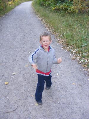 Noah running down the trail