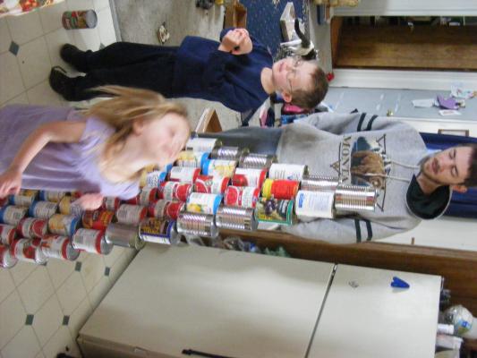 David, Noah and Sarah like to build towers.