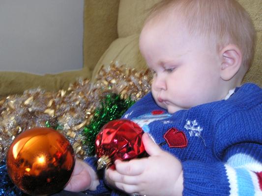 Sarah admires her Christmas Balls.