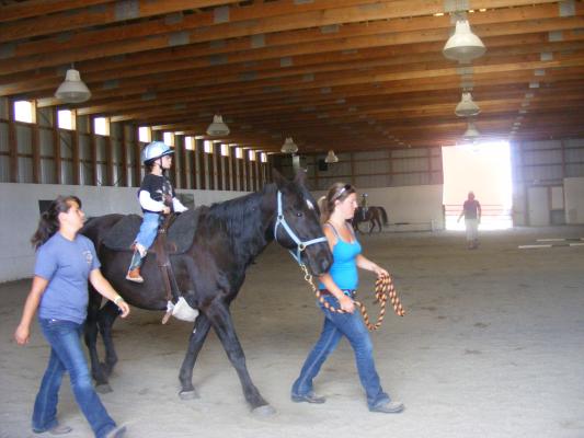 Noah riding a horse at Eaglemount