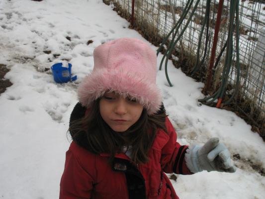 Andrea plays outside.