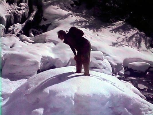 Eugene inspects the ice at Mission Falls.
