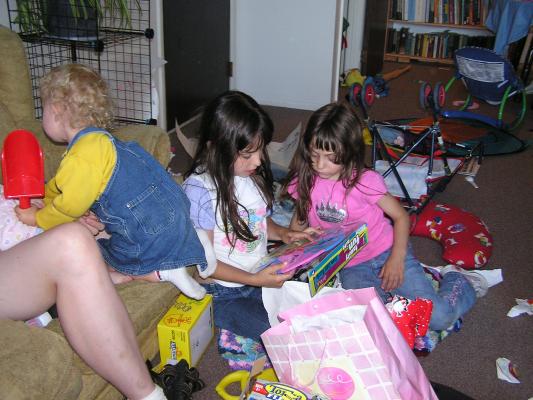 Malia and Andrea look at their, er, Noah's new toys.