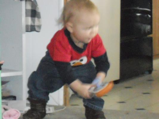 Joshua with a game controller. 