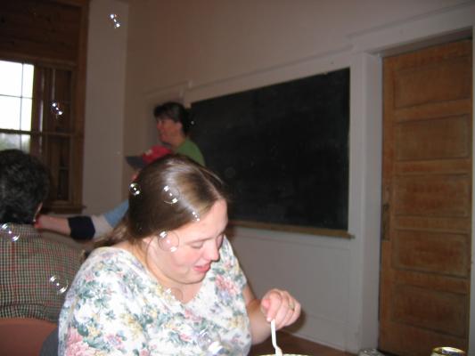 Jennifer blows some bubbles