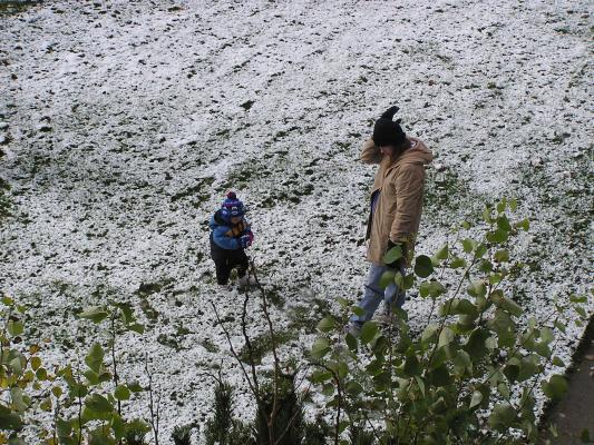 Katie and Noah play in the snow.