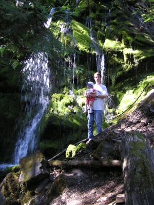 David and Sarah by a waterfall on the Eder family campout near plains.