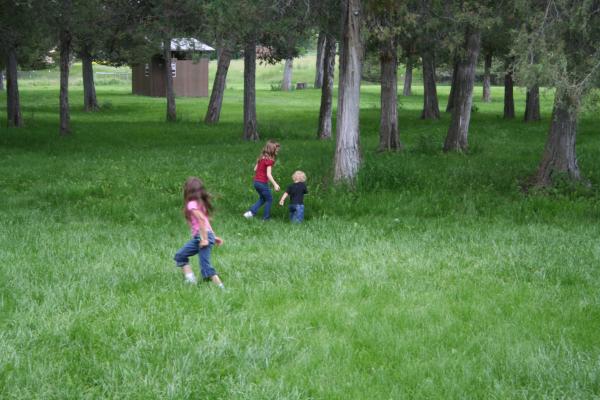 Andrea and Nicole play with Noah.