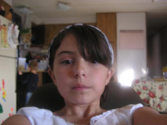 Malia takes a picture of herself