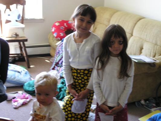 Malia and Andrea wear their new aprons.