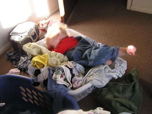 Noah decided to help with the laundry.