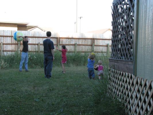 Matthew, Jim, Malia, Noah and Sarah play ball.