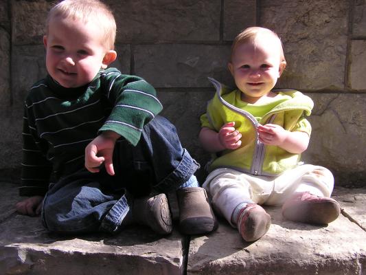 Noah and Sarah by a rock wall at MSU. 
Look they're both happy.