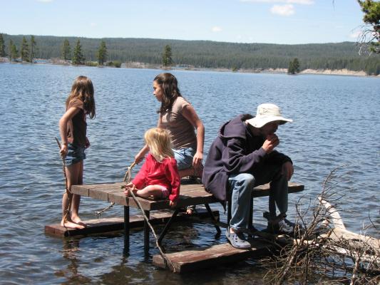 Andrea, Sarah, Malia and David sail away on the picnic table.