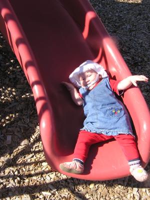 Sarah likes to go down slides.