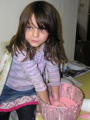 Andrea plays in the pink goo.