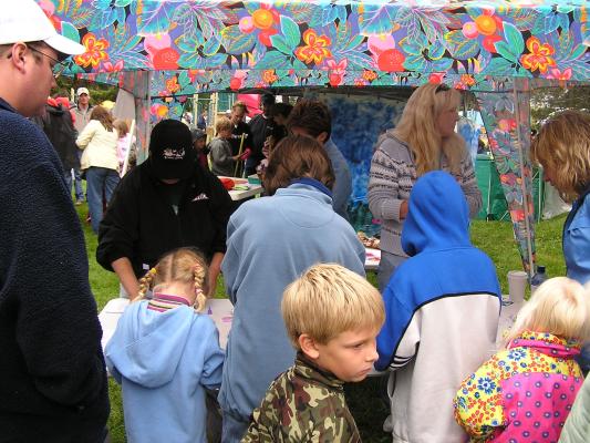 People visit the GVCC booth at the Belgrade Fall Festival