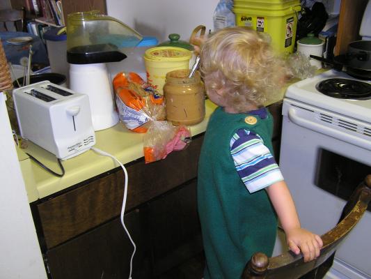 Noah decided to make himself a peanut butter sandwich.