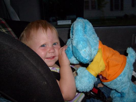 Sarah plays with Blue in the car