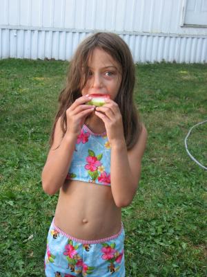 Andrea eats watermelon