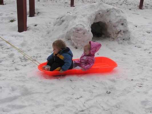 Noah and Sarah are in the sled.