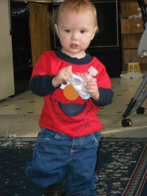 Joshua is one! Grandma Eder gave him an old bottle. Obviously that was not his only present, but he does like it. 