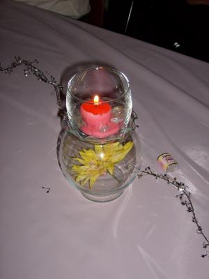 candles on the tables at the wedding reception