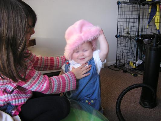 Andrea and Sarah in a hat.